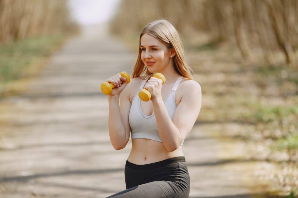 Woman exercising to build stress tolerance